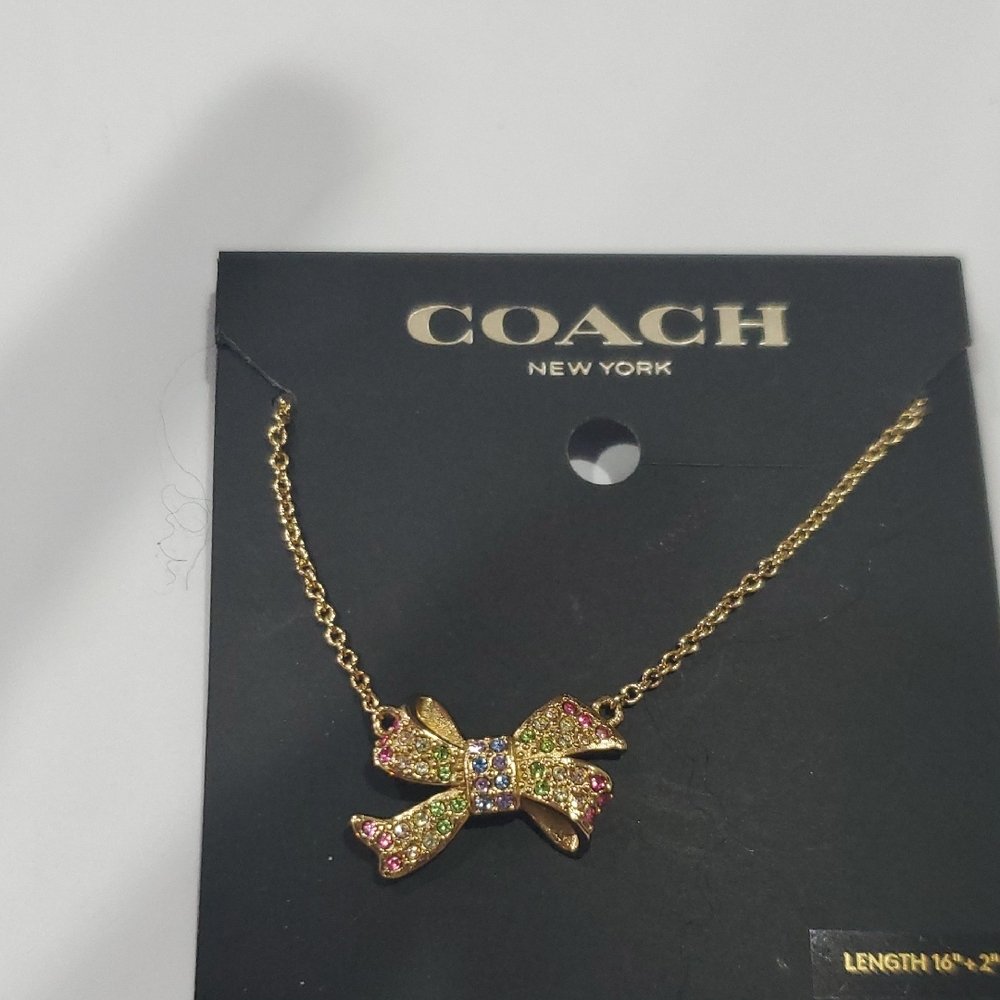 Coach multicolored pave crystals studded bow pendant necklace‎ new